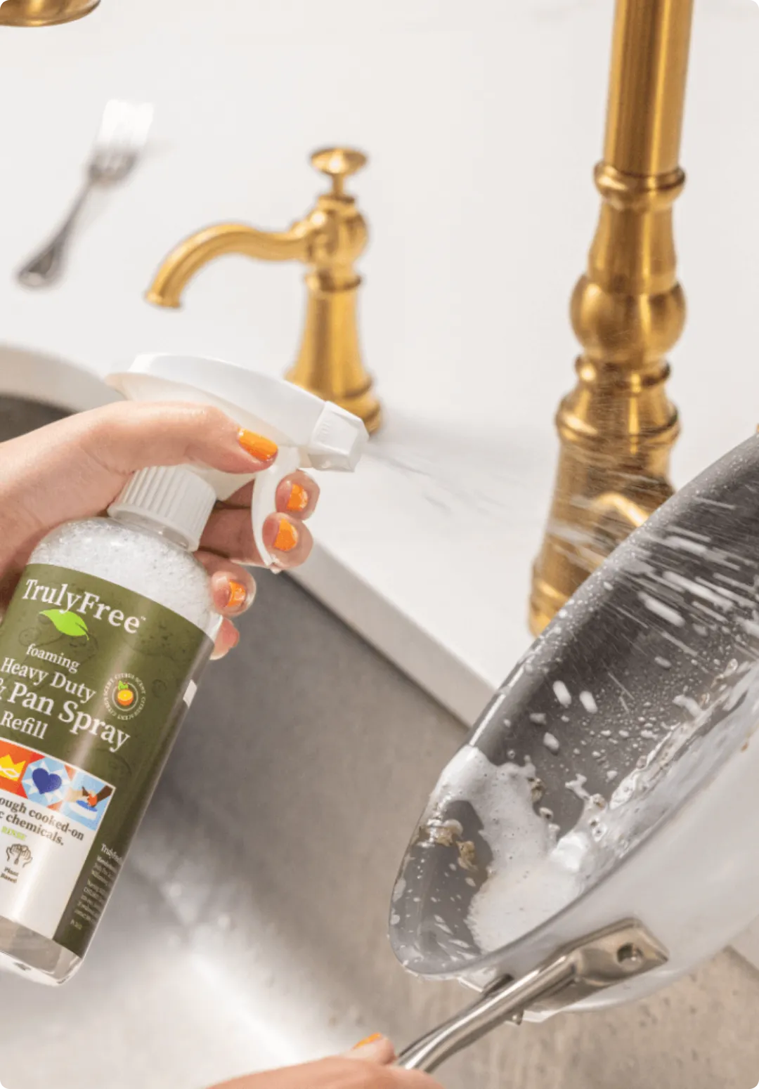 person using Pot And Pan Spray